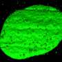 Glowing green blobs of